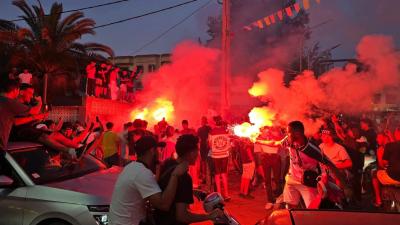 Joie des supporters algériens après la qualification des Verts pour les 16es